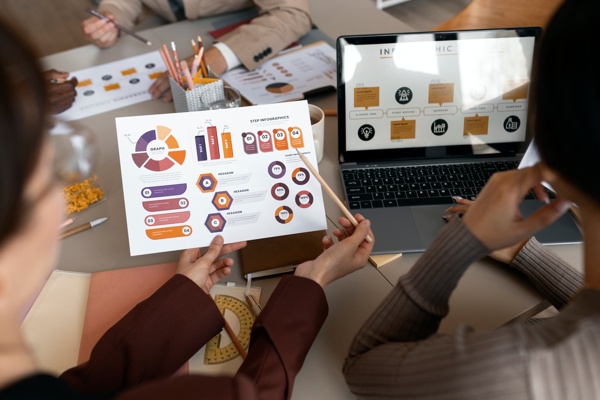 high-angle-people-working-with-laptop